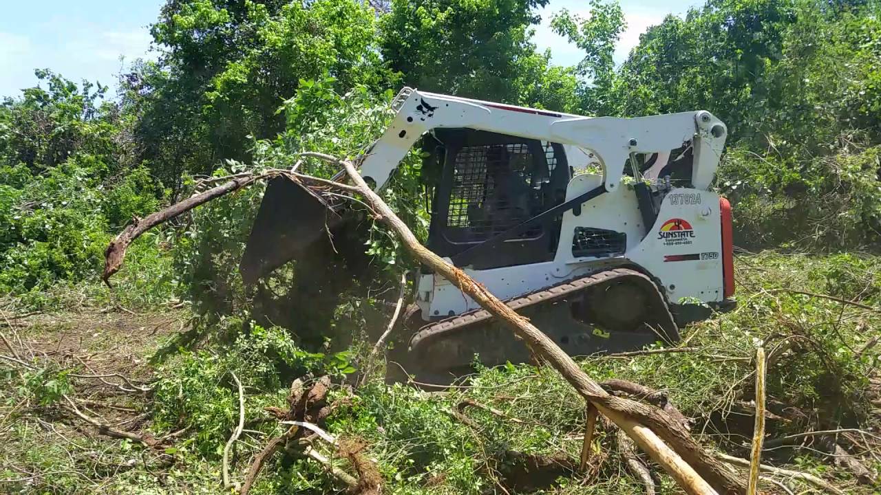 Land Clearing with a Skid Steer Cumming & Alpharetta Lawn Service